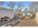 Cozy backyard with a grill and seating area, perfect for outdoor dining at 1548 Ulster St, Denver, CO 80220