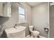 Bathroom featuring modern fixtures and a clean, minimalist design at 1548 Ulster St, Denver, CO 80220