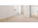Bedroom view with window and closet access, neutral walls and carpeting at 1356 Castle Creek Cir, Castle Rock, CO 80104