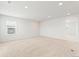 Bright bonus room with neutral carpet and natural light, a versatile space for various activities at 1356 Castle Creek Cir, Castle Rock, CO 80104