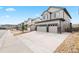 Exterior view of modern two-story homes with attached two-car garages at 1356 Castle Creek Cir, Castle Rock, CO 80104