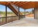 Outdoor patio featuring a wooden deck above and expansive view of the surrounding community at 1356 Castle Creek Cir, Castle Rock, CO 80104