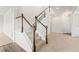 Elegant staircase with carpeted steps and white railings, connecting the home's levels seamlessly at 1356 Castle Creek Cir, Castle Rock, CO 80104