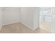 Walk-in closet featuring wall-mounted wire shelving with bathroom access at 1356 Castle Creek Cir, Castle Rock, CO 80104