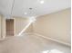 Expansive basement space with neutral carpeting, perfect for customization and flexible living arrangements at 7669 Pecos St, Denver, CO 80221