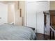 Bedroom featuring wood furniture, closet and neutral tones at 7669 Pecos St, Denver, CO 80221