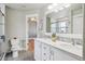 Contemporary bathroom featuring double vanity, subway tiles, and modern fixtures at 2924 Fulton St, Denver, CO 80238