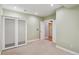 Bedroom features an interior entrance and mirrored closet doors at 2924 Fulton St, Denver, CO 80238