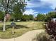 Private green space for residents only with a 'no public use' sign at 2924 Fulton St, Denver, CO 80238