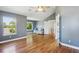 Bright living room boasting hardwood floors, high ceilings, and ample natural light at 2924 Fulton St, Denver, CO 80238