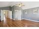 This main bedroom features hardwood floors, vaulted ceilings, and ensuite bathroom access at 2924 Fulton St, Denver, CO 80238