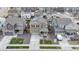 Aerial view of the home displaying well-maintained landscaping, curb appeal, and neighborhood setting at 13144 E 109Th Pl, Commerce City, CO 80022