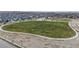 Expansive green space offers a serene retreat and recreational area in the heart of the residential community at 13144 E 109Th Pl, Commerce City, CO 80022