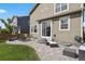 Backyard with a paver patio that provides ample seating and dining space at 13144 E 109Th Pl, Commerce City, CO 80022