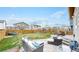 Spacious backyard with patio, lawn, and play area, offering versatile outdoor enjoyment at 13144 E 109Th Pl, Commerce City, CO 80022
