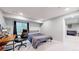 Basement bedroom featuring carpet floors, window, and black desk chair at 13144 E 109Th Pl, Commerce City, CO 80022