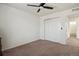 Bedroom featuring a ceiling fan and closet at 13144 E 109Th Pl, Commerce City, CO 80022
