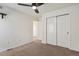 Bedroom featuring a ceiling fan and carpeted floors at 13144 E 109Th Pl, Commerce City, CO 80022