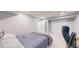Cozy bedroom features neutral paint, carpet, and convenient access to closets and an adjacent room at 13144 E 109Th Pl, Commerce City, CO 80022