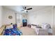 Cozy bedroom designed for a , featuring bright bedding and play area at 13144 E 109Th Pl, Commerce City, CO 80022
