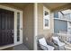 Cozy front porch with seating, creating a welcoming entrance to the home at 13144 E 109Th Pl, Commerce City, CO 80022