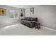 Finished basement living room with a couch at 13144 E 109Th Pl, Commerce City, CO 80022