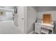 Carpeted office nook with a white desk and chair at 13144 E 109Th Pl, Commerce City, CO 80022