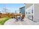 Back patio with BBQ and table, perfect for outdoor dining and entertaining in the backyard at 13144 E 109Th Pl, Commerce City, CO 80022