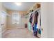 Spacious walk-in closet with custom shelving, ample storage, and natural light at 13144 E 109Th Pl, Commerce City, CO 80022