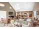 Spacious clubhouse with tables, chairs, and a TV for residents to gather and socialize at 4505 S Yosemite S St # 371, Denver, CO 80237
