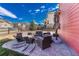 Brick patio featuring outdoor furniture set, perfect for entertaining with a view of the backyard at 21606 E Idyllwilde Dr, Parker, CO 80138