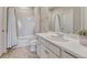 White bathroom with tub, shower and white vanity at 21606 E Idyllwilde Dr, Parker, CO 80138