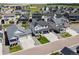 Aerial view of homes in a modern neighborhood, showcasing the area's new construction and planned community at 1425 Hart Ln, Elizabeth, CO 80107