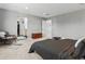 Spacious main bedroom features a comfortable bed, chair, and multiple closets providing ample storage at 1425 Hart Ln, Elizabeth, CO 80107