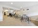 Finished basement with workout equipment and rec area at 16902 W 94Th Pl, Arvada, CO 80007