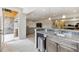 Finished basement with bar, with easy access to the outdoors at 16902 W 94Th Pl, Arvada, CO 80007