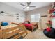 bedroom featuring natural light and a playful design at 16902 W 94Th Pl, Arvada, CO 80007