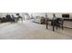 Spacious room featuring carpet flooring, large windows and contemporary furnishings at 16902 W 94Th Pl, Arvada, CO 80007