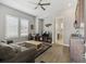 Cozy living room with wood floors, natural light, and modern decor at 16902 W 94Th Pl, Arvada, CO 80007