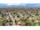 Aerial view of home in neighborhood with a mountain view in the distance at 6975 S Chase Ct, Littleton, CO 80128