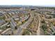 Stunning aerial view of a residential neighborhood surrounded by lush greenery and vibrant cityscape at 5058 E Cherry Creek South Dr, Denver, CO 80246