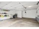 Spacious two-car garage featuring ample storage space and organization solutions at 5058 E Cherry Creek South Dr, Denver, CO 80246