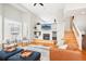 Cozy living area with a fireplace, TV, and comfortable seating, great for relaxing at 5058 E Cherry Creek South Dr, Denver, CO 80246