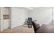 Cozy office space featuring a sink, large closet, reading chair and wooden desk, perfect for remote work at 5058 E Cherry Creek South Dr, Denver, CO 80246