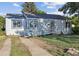 A ramp makes this cozy single-story home more accessible to all at 2105 S Irving St, Denver, CO 80219