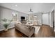 Spacious living room with lots of natural light, modern furniture, and an open floor plan at 2393 Yosemite St, Denver, CO 80238