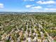 An aerial view looking toward the skyline of a suburban neighborhood at 4456 S Washington St, Englewood, CO 80113