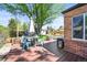 Deck features outdoor dining set and seating at 4456 S Washington St, Englewood, CO 80113