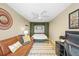 This room features a murphy bed, desk, and a window at 4456 S Washington St, Englewood, CO 80113