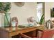 Cozy desk nook featuring vintage desk with wood frame chair and stylish decor for a functional workspace at 4456 S Washington St, Englewood, CO 80113